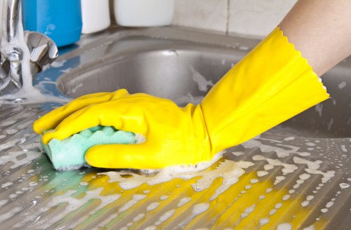 Spot cleaning a couch with a microfiber cloth