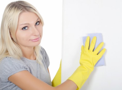 Close-up of stain removal during upholstery cleaning service